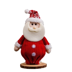 Knitted Santa Claus gift bag with red white yarn texture and wooden base for Christmas