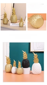 Detailed view of modern pineapple resin ornaments in gold, white and black matte finishes