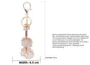 Vue détaillée montrant les dimensions du porte-clés violon doré orné de strass