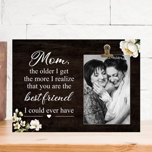 Close-up of wooden photo frame with sentimental text and photo for Mother's Day
