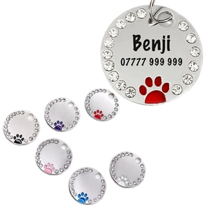 Custom stainless steel pet ID tag with sparkling rhinestones and colorful paw prints