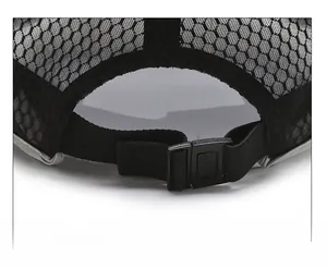 Detail of breathable black mesh back and adjustable plastic snap closure for trucker cap