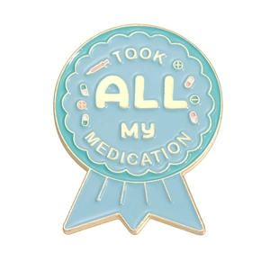 Blue enamel medal pin with Took All My Medication text and golden medical icons