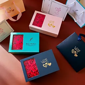 Elegant rose jewelry gift box set with soap flowers and matching gold-stamped tote bags
