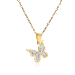 Vintage gold butterfly necklace with white enamel and sparkling rhinestones on white background