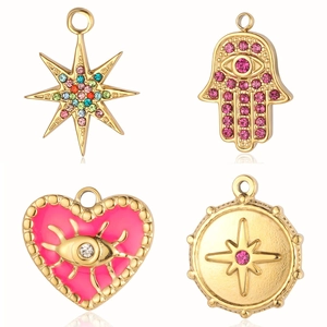 Goldene Edelstahl-Anhänger-Set mit Herz-Dämonenauge und Himmelskörper-Sternen-Motiven