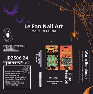 Detail of Halloween press-on nails featuring pumpkin, skull, and spider web patterns