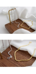 Detail showing the fine spiral texture of the S925 sterling silver chain in gold and silver