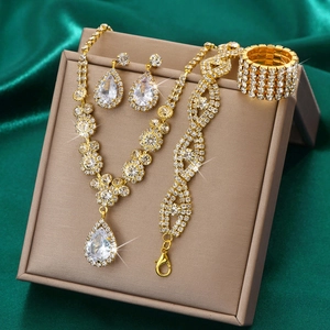 Elegant gold bridal jewelry set with sparkling crystal waterdrop necklace and earrings