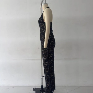 Side view detail of sexy black lace halter dress with sheer texture and backless design