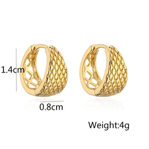 Detail showing 1.4cm by 0.8cm dimensions of gold hollow rhombic pattern earrings