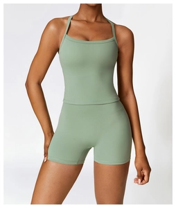 Detailed view of high-elastic sage green sports vest and high-waist biker shorts set