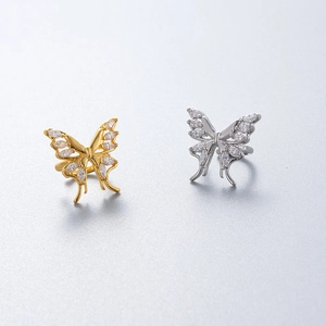 Elegant gold and silver butterfly ear cuffs set with marquise-cut cubic zirconia stones
