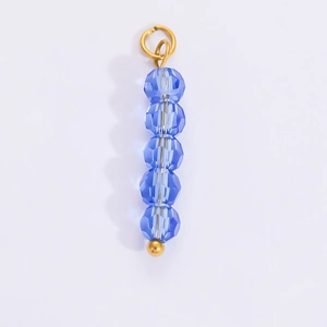 Detailed view of blue faceted crystal beads pendant with 18k gold plated stainless steel