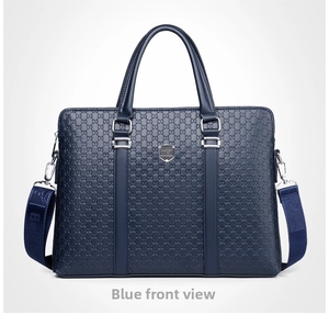 Front view of a blue embossed leather business briefcase with detachable woven shoulder strap