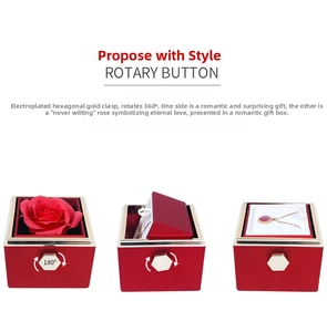 Mechanical rotating jewelry gift box showing 180-degree flip from soap rose to necklace holder