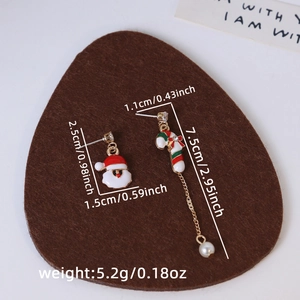 Detailed size chart for asymmetrical Christmas earrings with dimensions and weight info