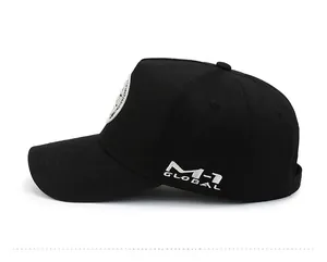 Detailed side view of black cotton baseball cap with M-1 GLOBAL white embroidery