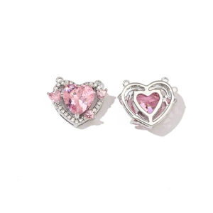 Detailed front and back view of silver heart pendant with pink crystals and clear gems