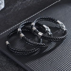 Men's double-layer black leather bracelet with silver steel beads on carbon fiber bag