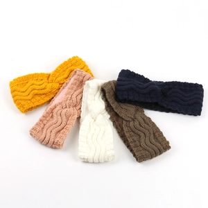 Detail showing five knitted winter headbands with wave texture and warm fleece lining