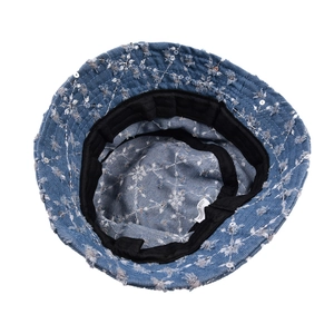 Blue denim bucket hat with silver sequins and floral embroidery featuring cotton lining