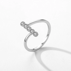 Irregular S925 sterling silver open ring with five cubic zirconia stones on white background