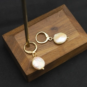 Vintage golden hoop earrings with baroque natural pearls and high-quality metallic finish