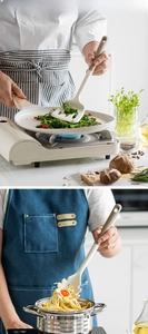 Detail of cream white heat-resistant silicone turner and pasta server in use