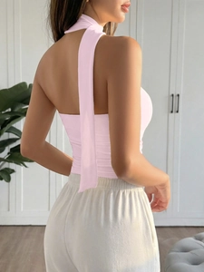 Pink halter neck top with long back ties for women, stylish Y2K fashion aesthetics