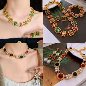 Vintage heart jewelry set with gold finish and colorful gemstones for a royal retro look