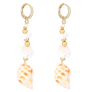 Detailed view of bohemian dangle earrings with natural conch shells and gold-tone alloy hooks