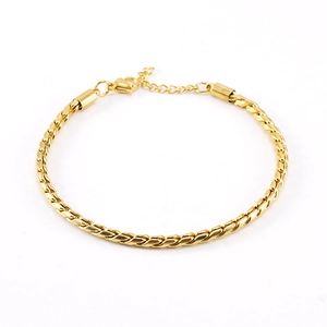Bracelet fin pour femme en acier inoxydable plaqué or 18 carats sur fond blanc