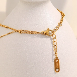 18K gold-plated stainless steel dolphin necklace with layered beads and adjustable clasp