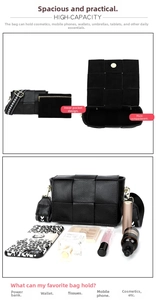 Detail of black woven leather square bag showing wide embroidered strap and interior storage
