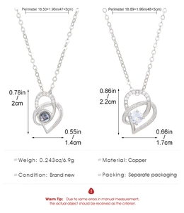 Detail of heart projection necklace with I Love You engraving and copper material specs