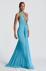 Detailed view of sky blue halter neck dress with pleated waist and elegant mermaid hem