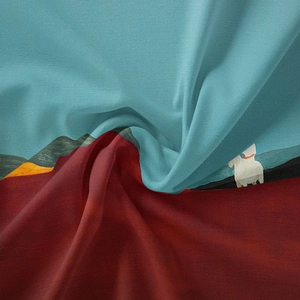Macro detail of bohemian wall tapestry fabric showing twill texture and artistic landscape