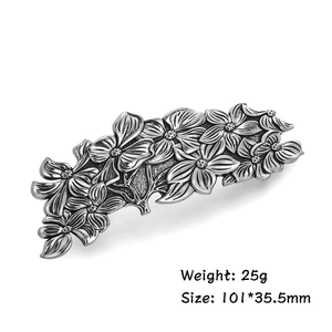 Vintage Nordic silver flower hair clip for women with detailed metal floral design