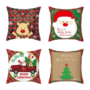 Set of 4 Christmas pillow covers with reindeer, Santa, and red truck holiday patterns