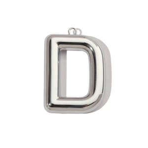 Macro view of a 3D hollow letter D pendant with polished silver finish and bail