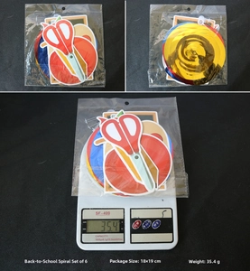 Back to school hanging swirl decorations featuring scissor cutout and colorful PVC spirals