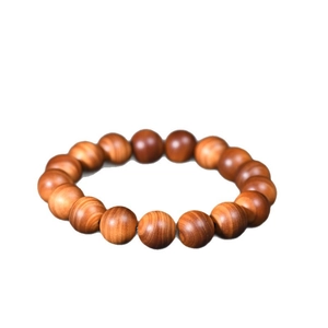 Handcrafted 12mm Thuja Sutchuenensis wood bead bracelet with rich oily texture