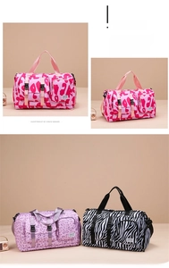Detail of multi-pocket travel bags featuring leopard and zebra animal prints with straps