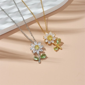 Daisy flower necklace with zircon petals and gold silver finish on aesthetic background
