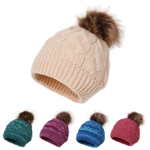 Winter knit baby beanie with a faux fur pompom in multiple colors for warmth