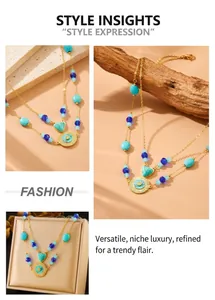 Detail of bohemian layered necklace with turquoise beads and sunburst metal pendants
