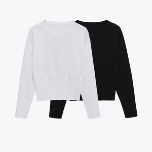 Classic round neck long sleeve knit cardigans in black and white with button front closure