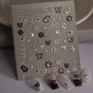 3D laser nail stickers featuring 3D butterfly, floral and heart designs in model Co-130