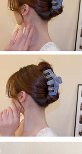 Detail showing marble texture grey-blue hair claw clip on model's bun hairstyle